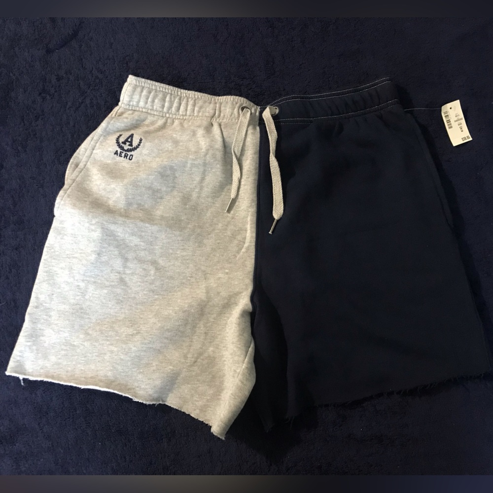 Color block men shorts from aero postale. Size medium. Half navy blue, half grey